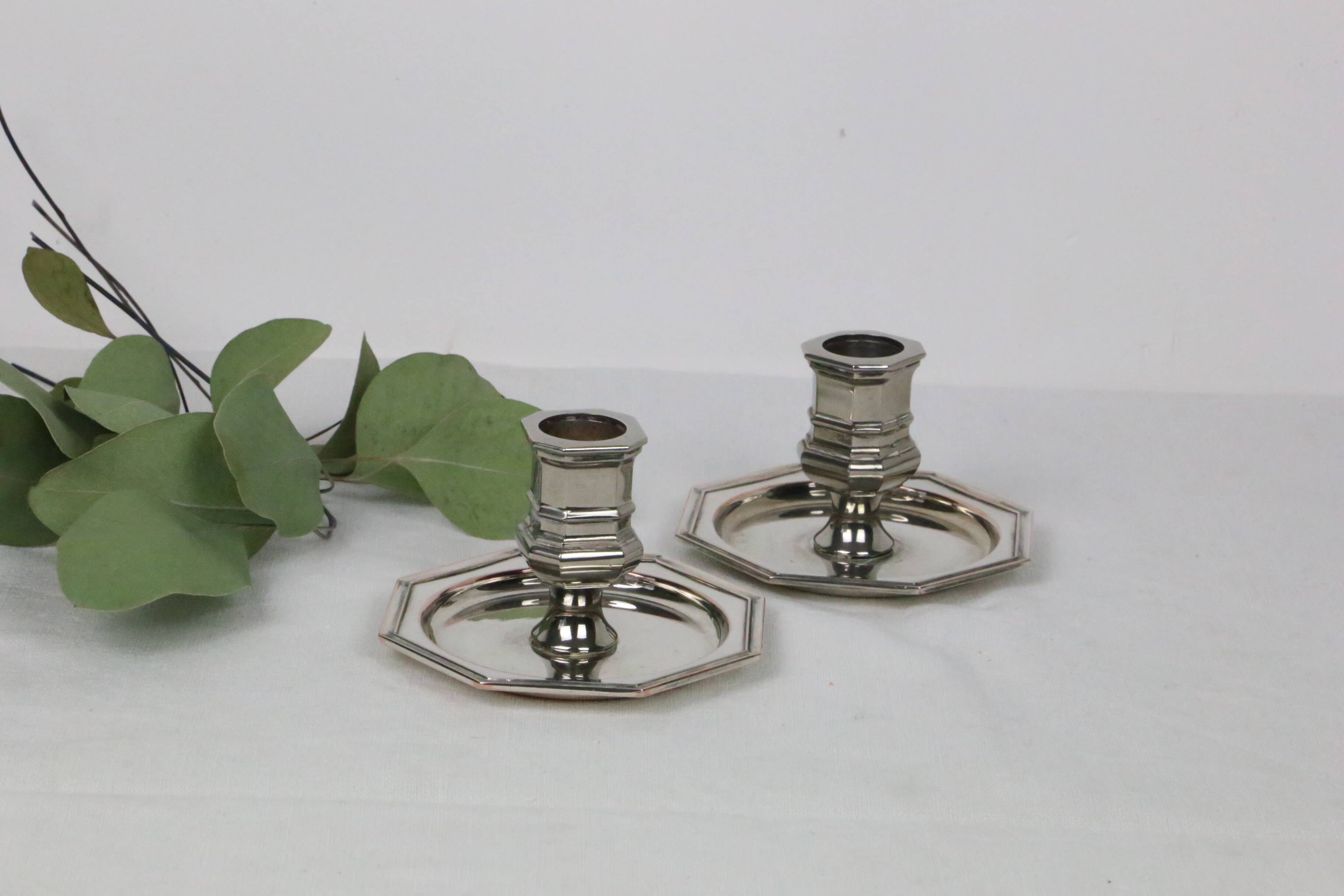 Pair of silver-plated metal candlesticks