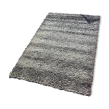 Rug in the style of a designer.