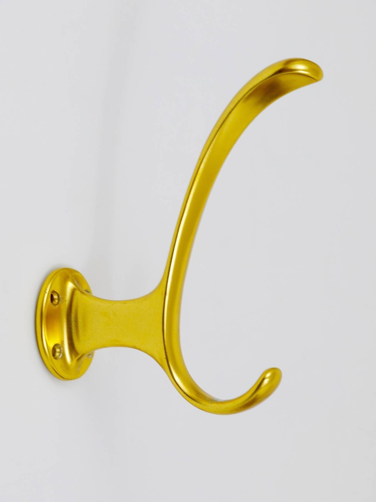 Set of four mid-century golden wall hooks, Austria, Vienna, 1950s.