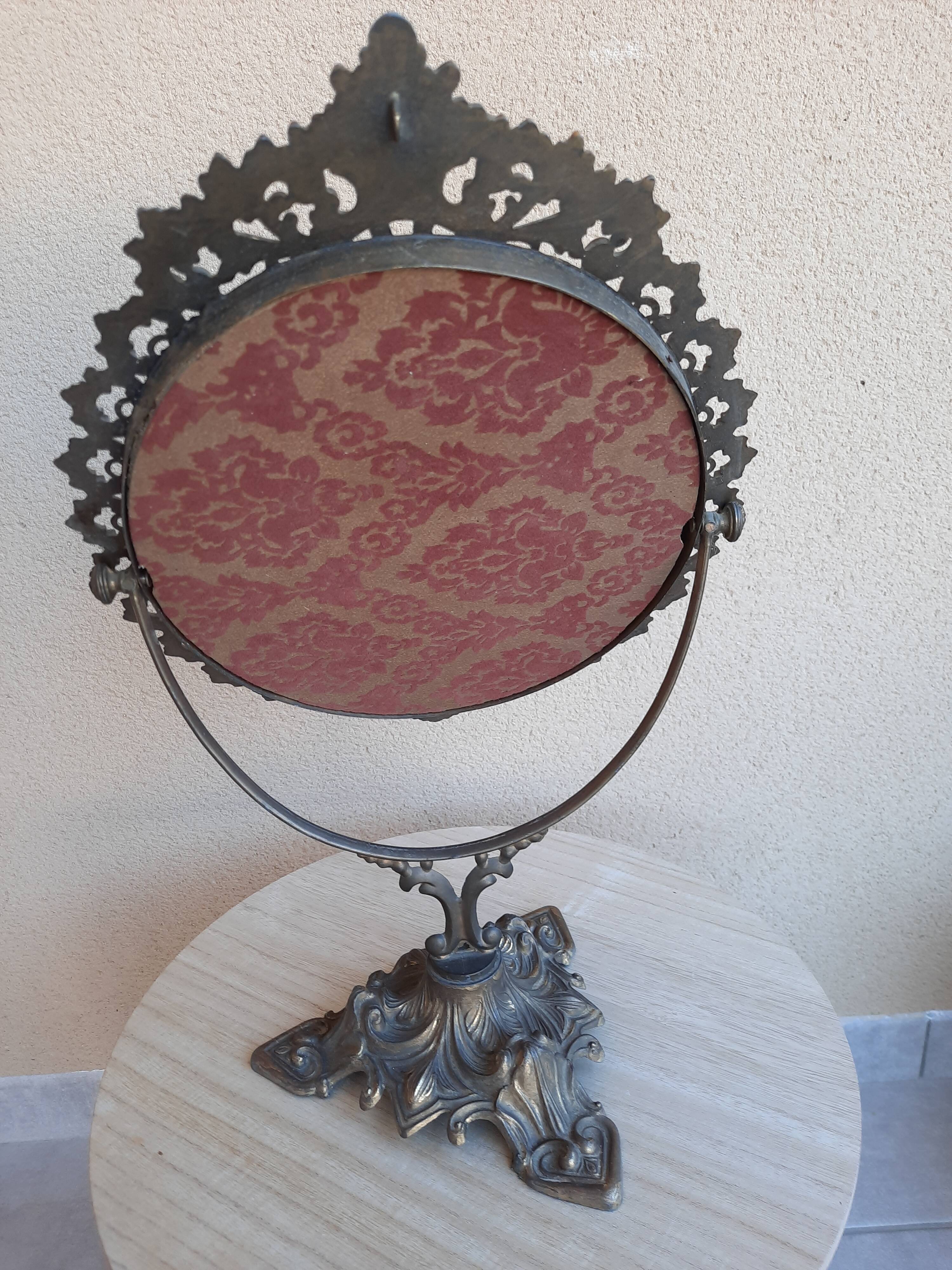 Mirror on foot, swivel, brass, mid-late nineteenth, rock style.