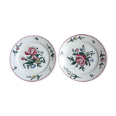 Two flat plates, pink floral decoration and tulip, in Sarreguemines earthenware, early XX century