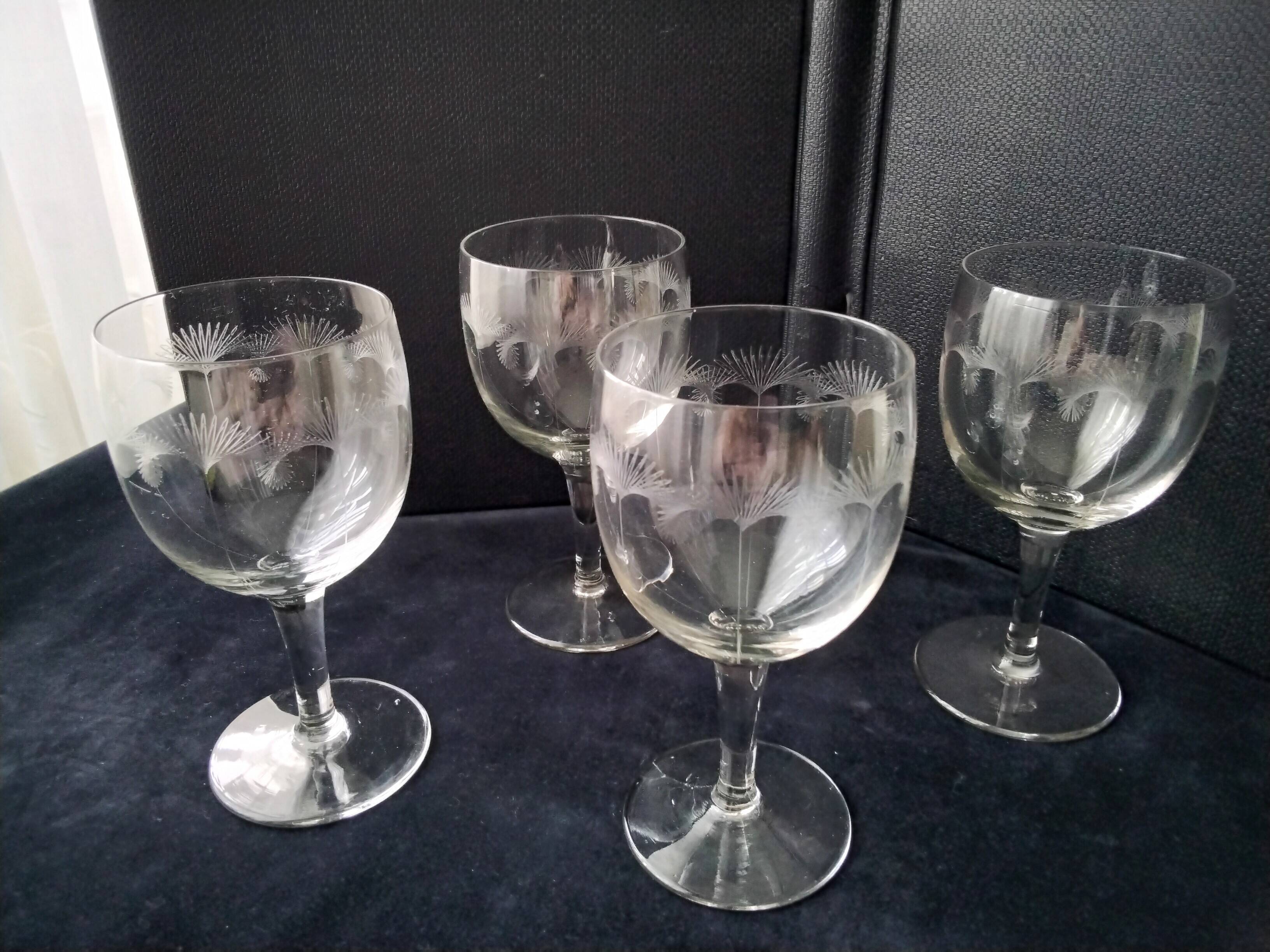 4 Antique stemmed glasses with ground decoration