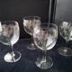 4 Antique stemmed glasses with ground decoration