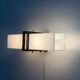 Simple white plexiglass wall light with a black metal frame, 1970s, Germany.
