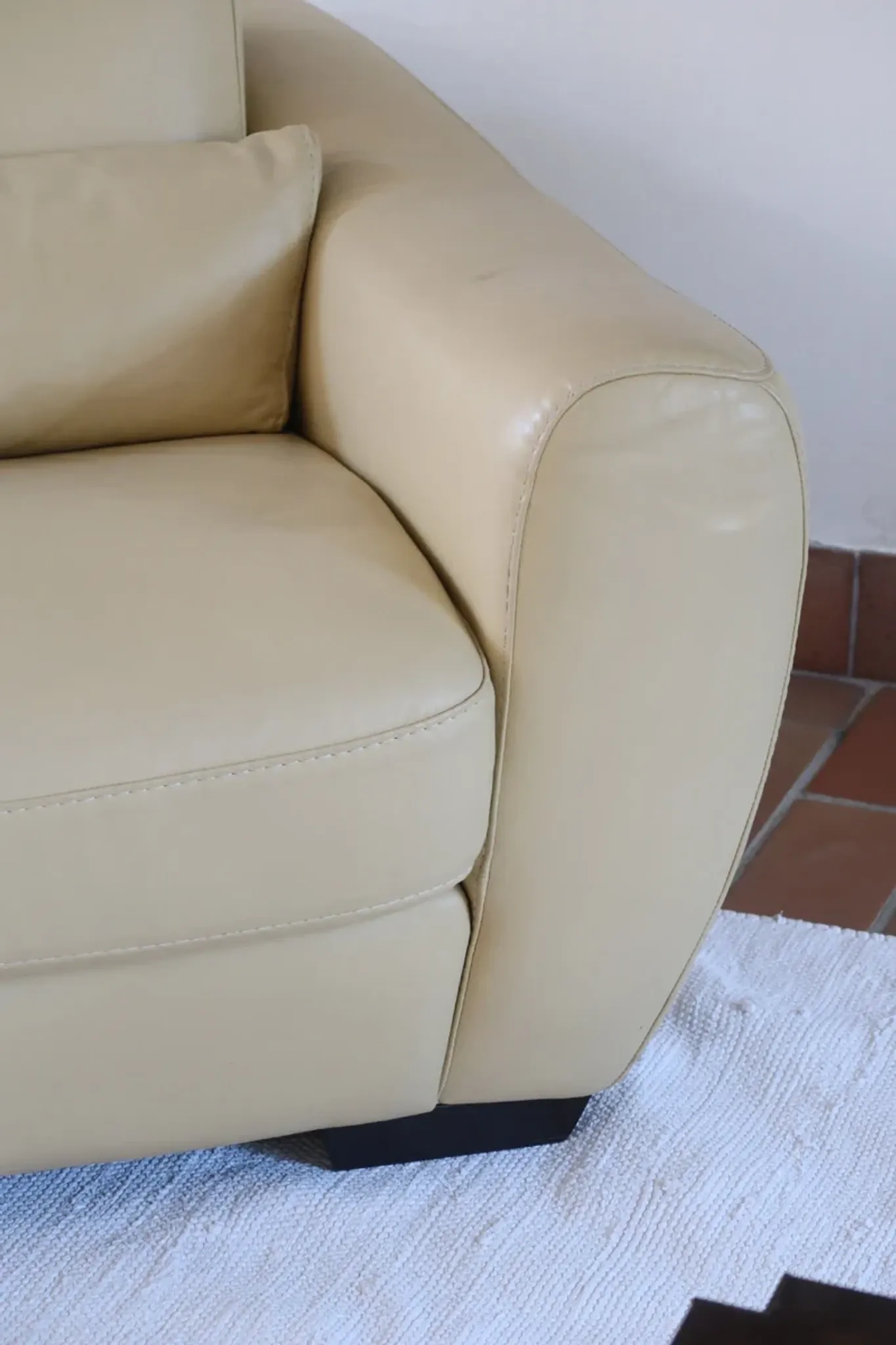 Vintage club armchair in butter yellow faux leather from the 1980s.