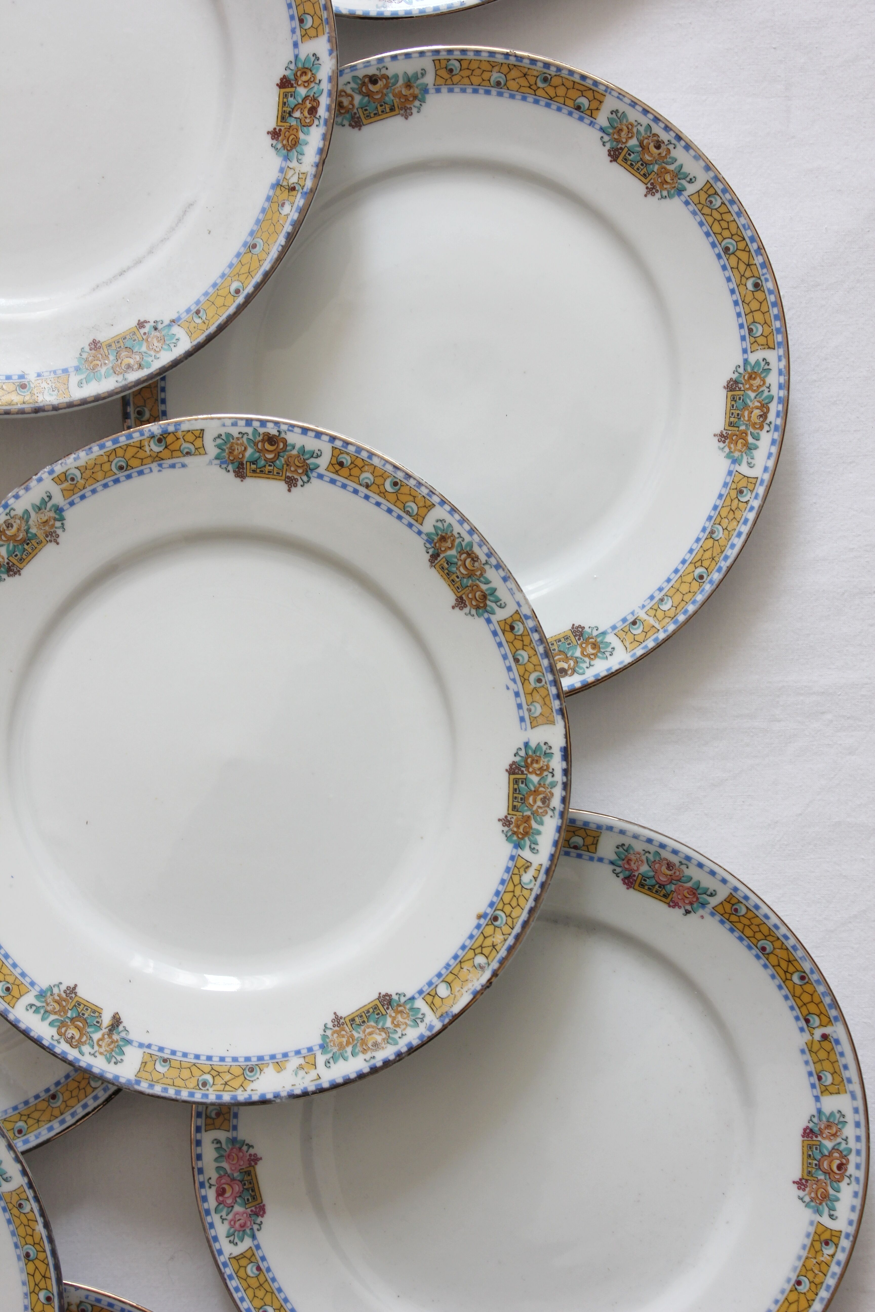 12 vintage porcelain dessert plates