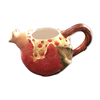 Pomegranate pitcher in dabbling