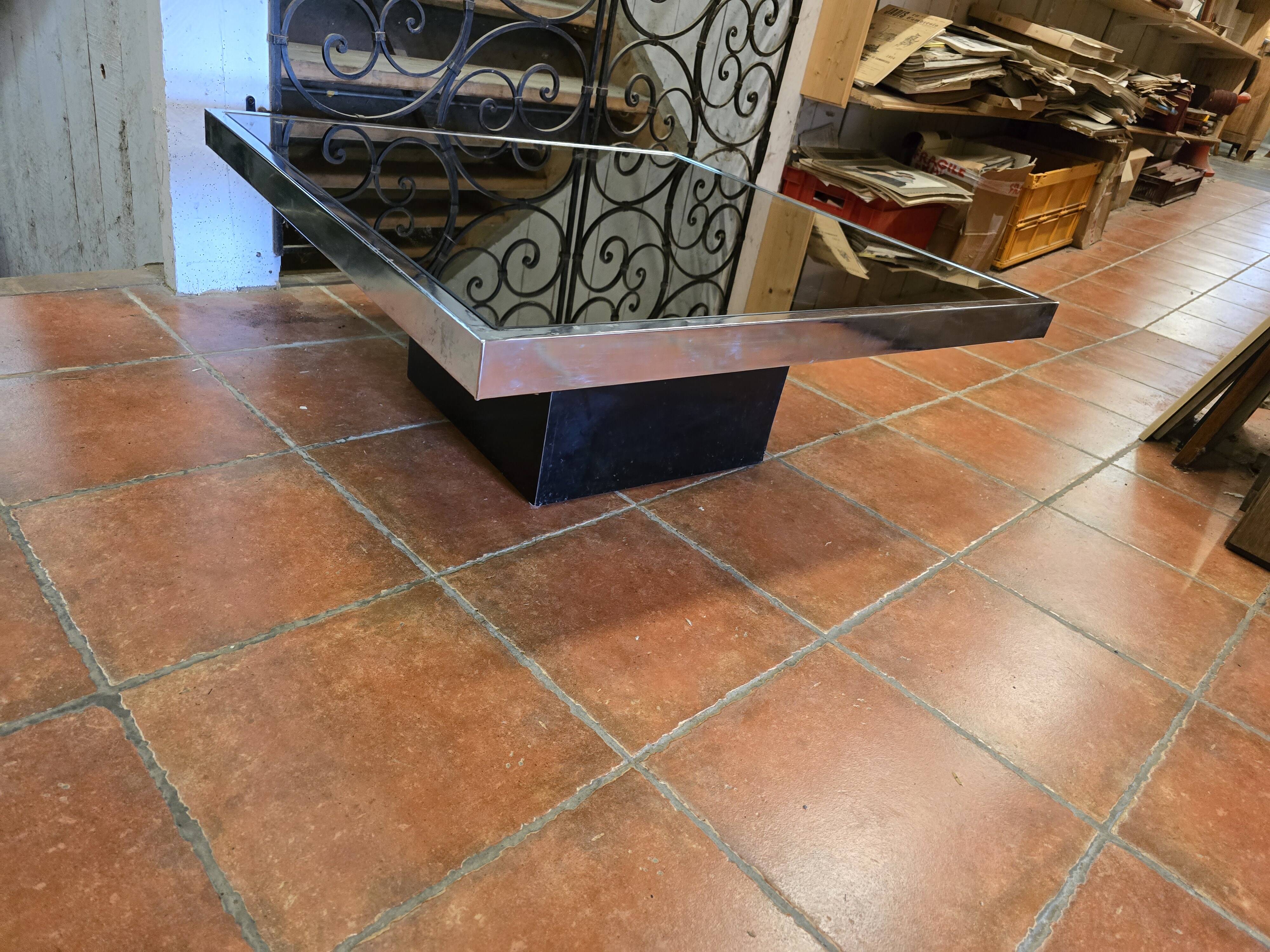 Chrome coffee table with smoked mirror top