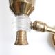 Pair of wall sconces in gold metal and plexiglass, 50 years