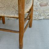 Trio of wooden chairs and mulched seat