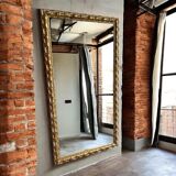 Vintage mirror cut out in a gilded wooden frame