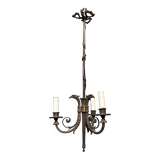 Empire-style bronze chandelier with 3 arms of light topped with eagle heads. French work. Circa 1900.