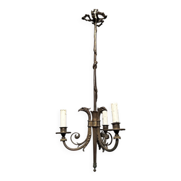 Empire-style bronze chandelier with 3 arms of light topped with eagle heads. French work. Circa 1900.
