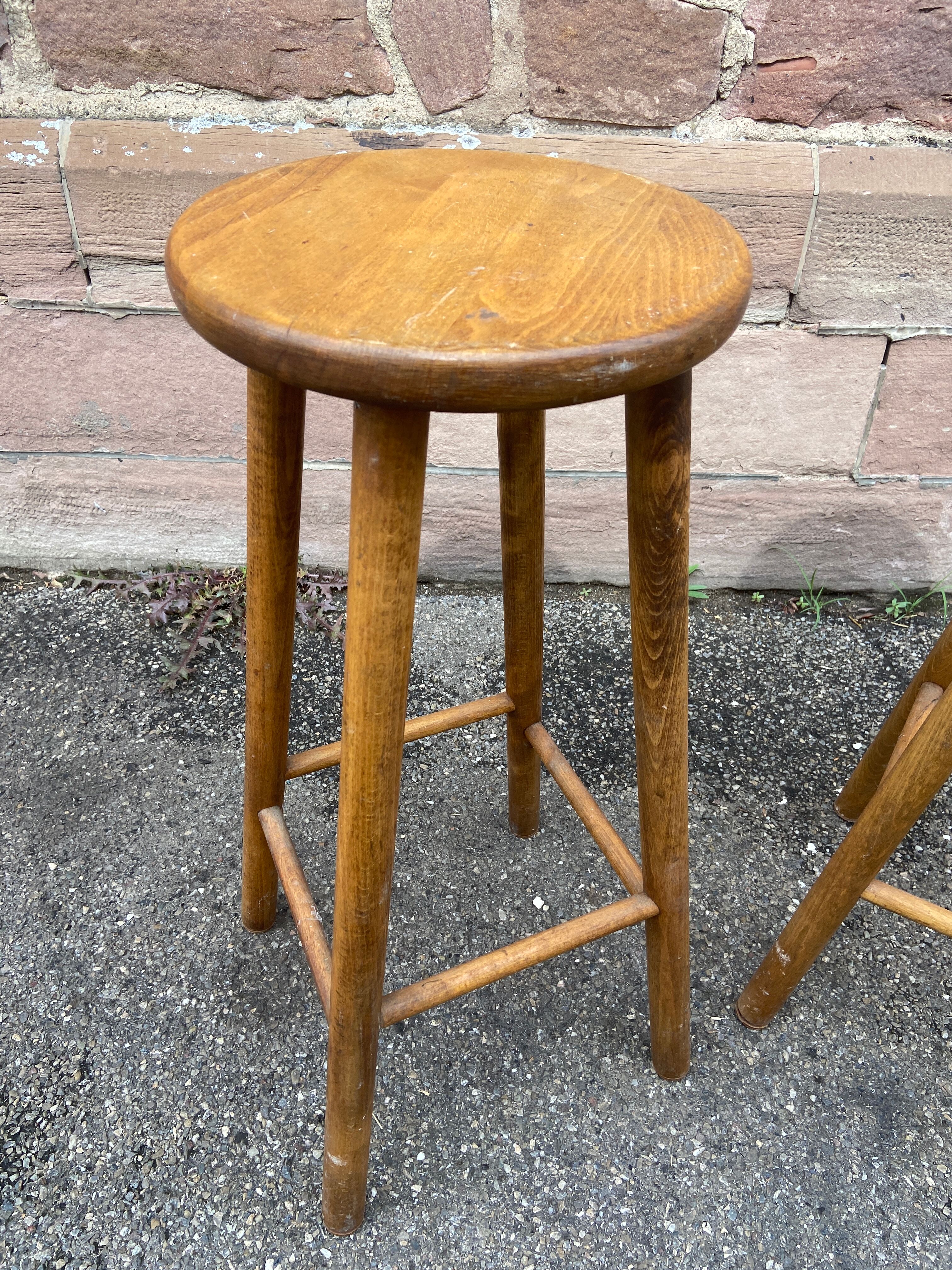 pair of vintage wooden bar stools