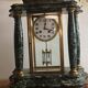 20th century bronze portico and cage clock signed cartier