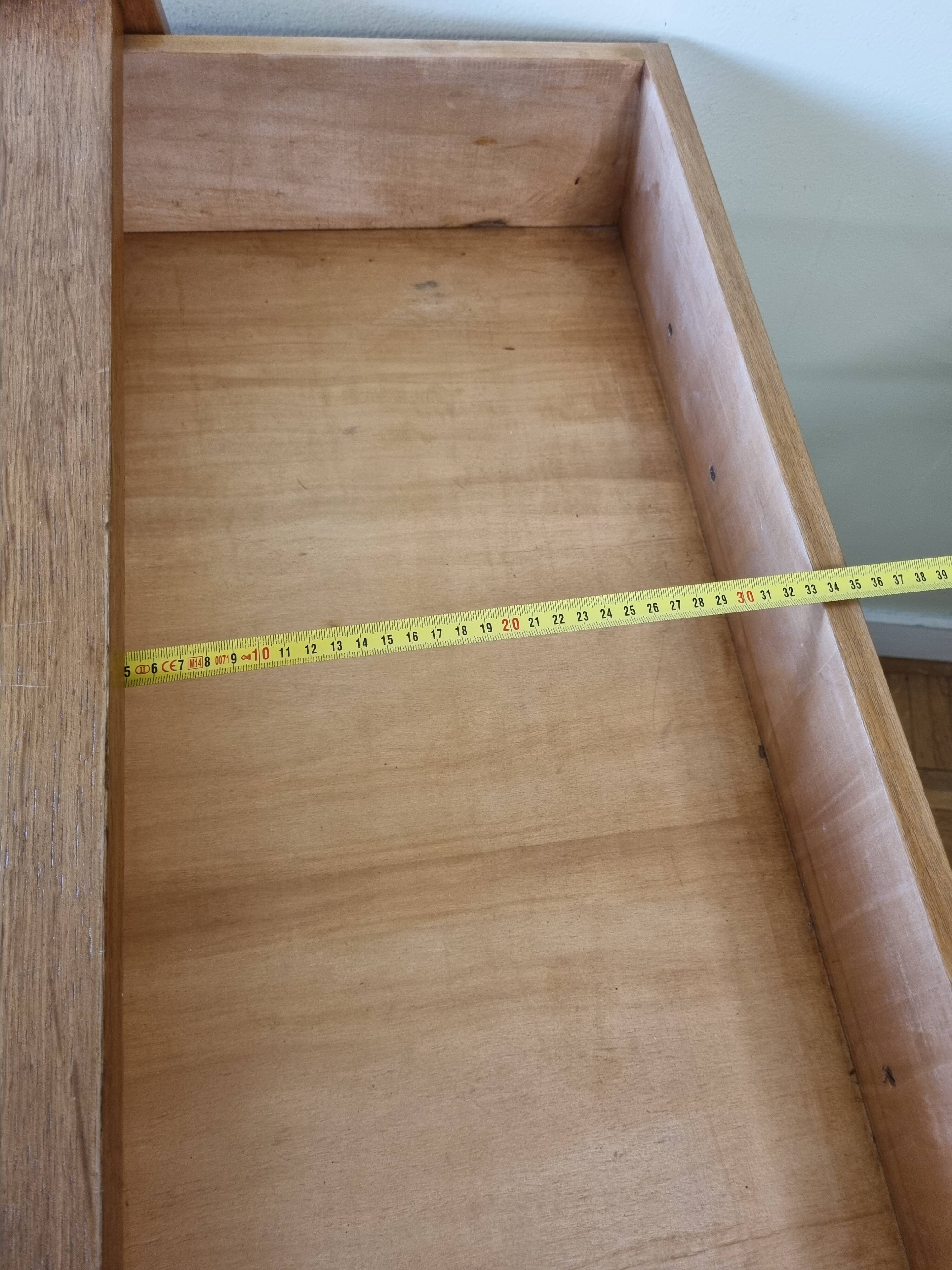 Vintage chest of drawers in modernist veneered wood from the 50s