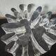Large glass candle holder in iceberg brutalist style.