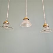 Trio of Art Deco grooved glass pendant lights, 1920s-30s