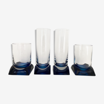 4 blue crystal glasses with rectangular base