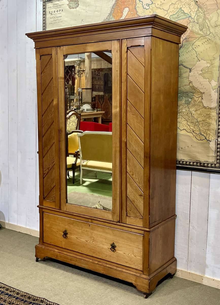English oak wardrobe from the early 20th century.