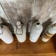 Set of 4 Old Grey Stoneware Bottles + Vintage Porcelain Stopper