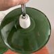 Pair of wall lights in green enameled sheet metal