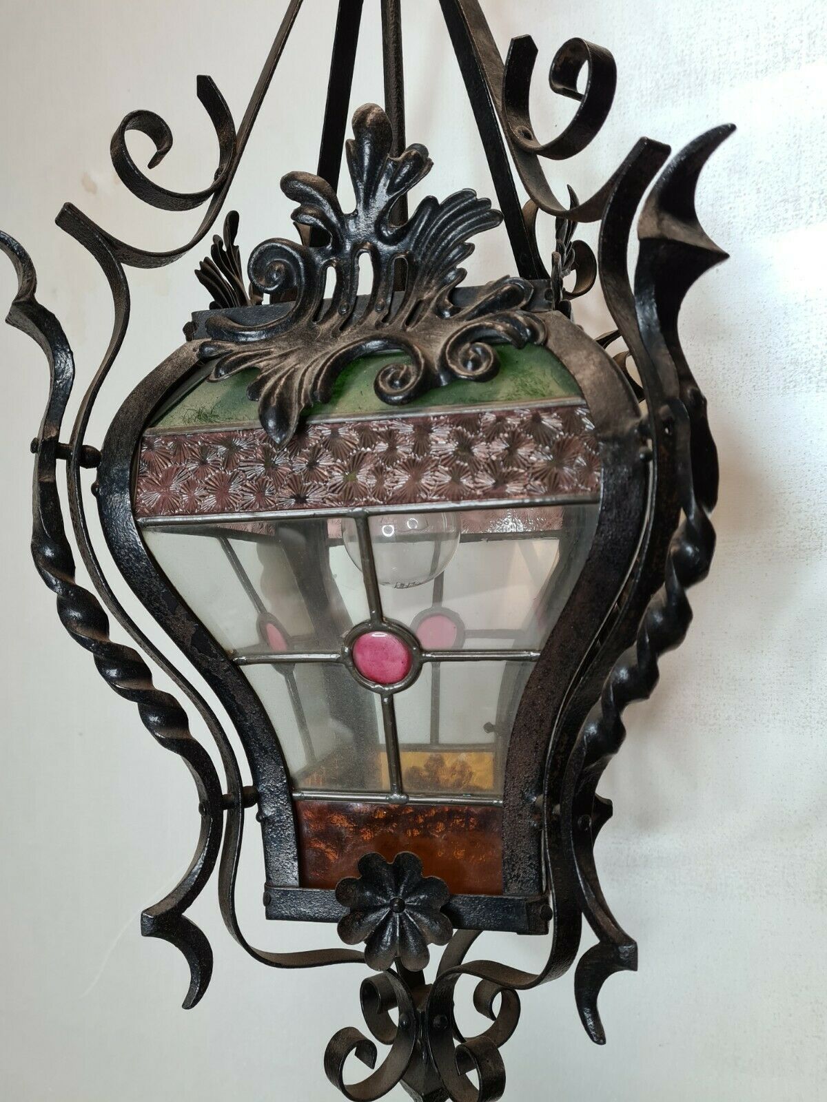 Wrought iron lantern with stained glass