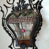 Wrought iron lantern with stained glass