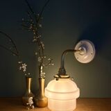 Vintage pink opaline globe wall light.