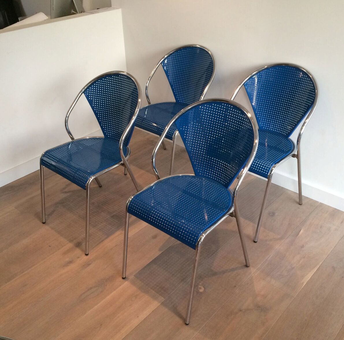 Set of 4 chairs chrome-based perforated metal blue color, around 1980