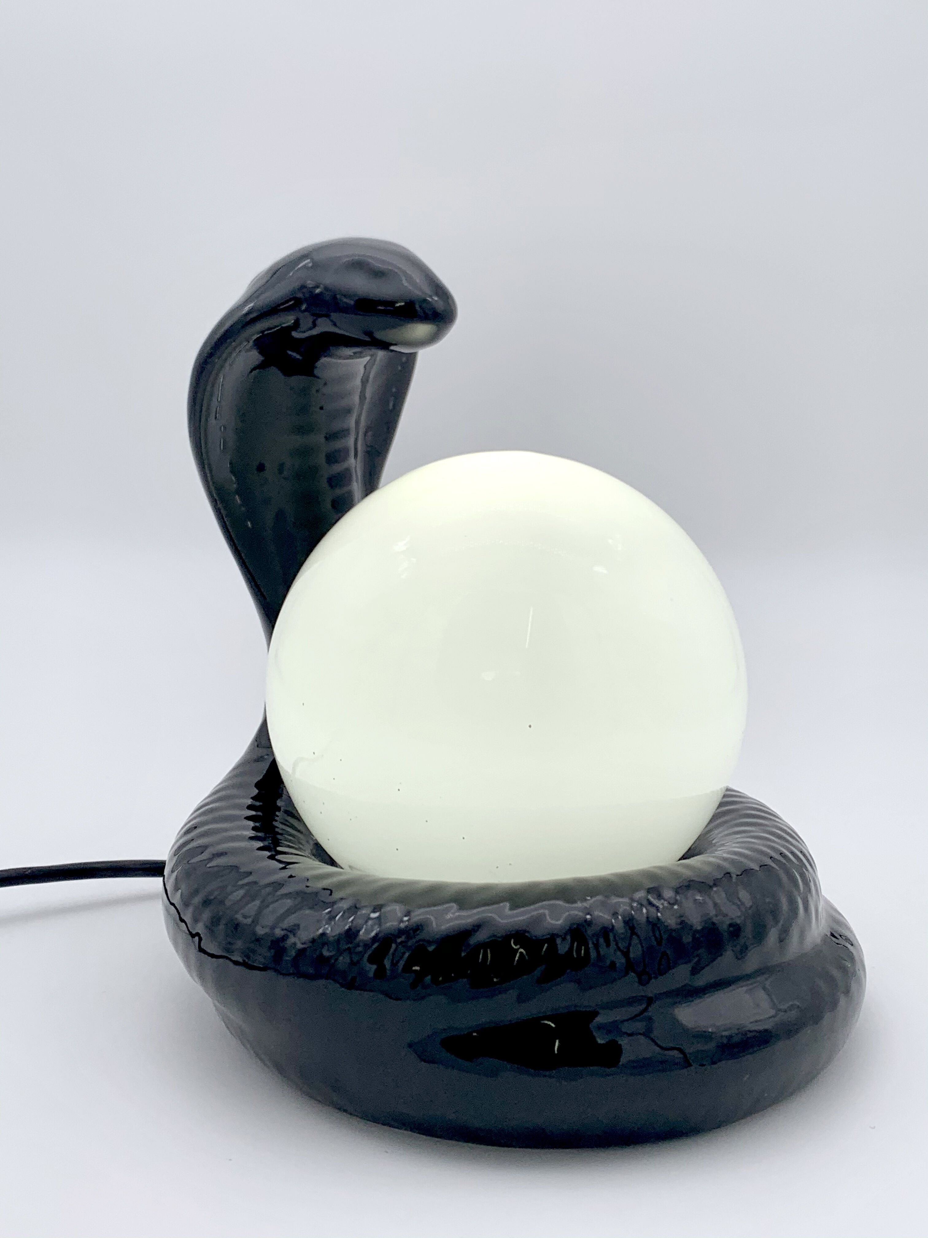 Black ceramic cobra lamp