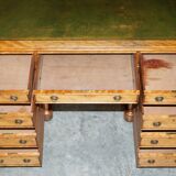 Antique desk by James Winter & Sons London in satin wood and leather.