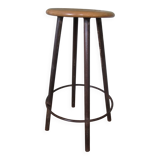 high factory stool made of wood and metal