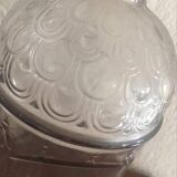 Guerlain bottle with bees.