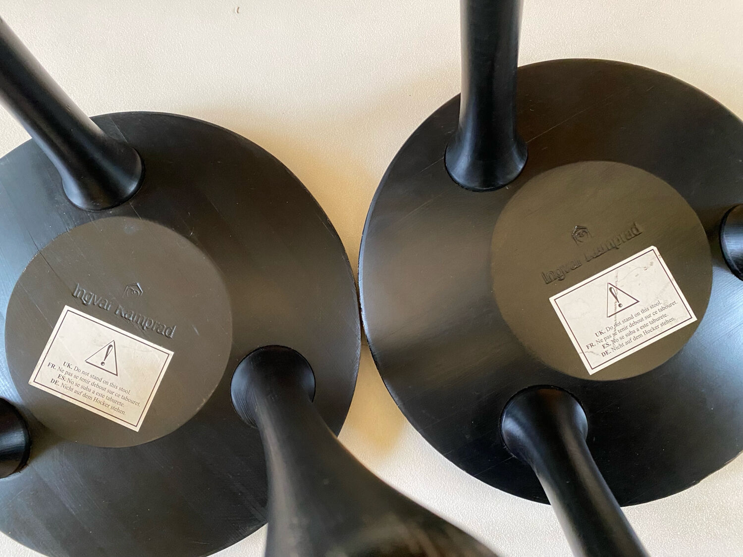 Pair of Ingvar Kamprad design tripod low stools, Habitat edition