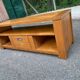 Solid pine wood TV unit stained with drawer and storage.