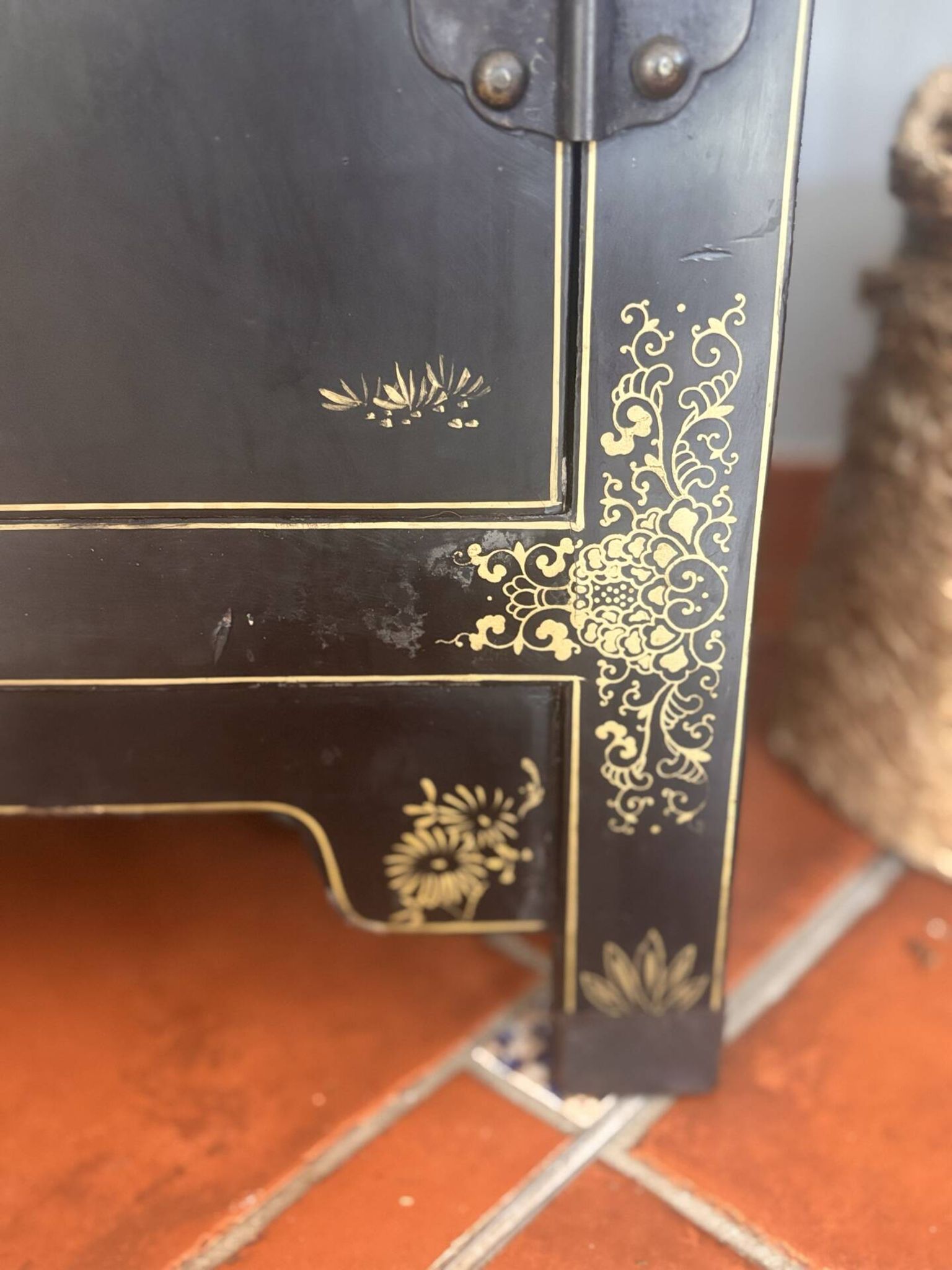 Magnificent black and gold lacquered Chinese cabinet.