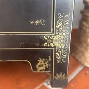 Magnificent black and gold lacquered Chinese cabinet.