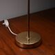 Pair of Scandinavian brass bedside lamps