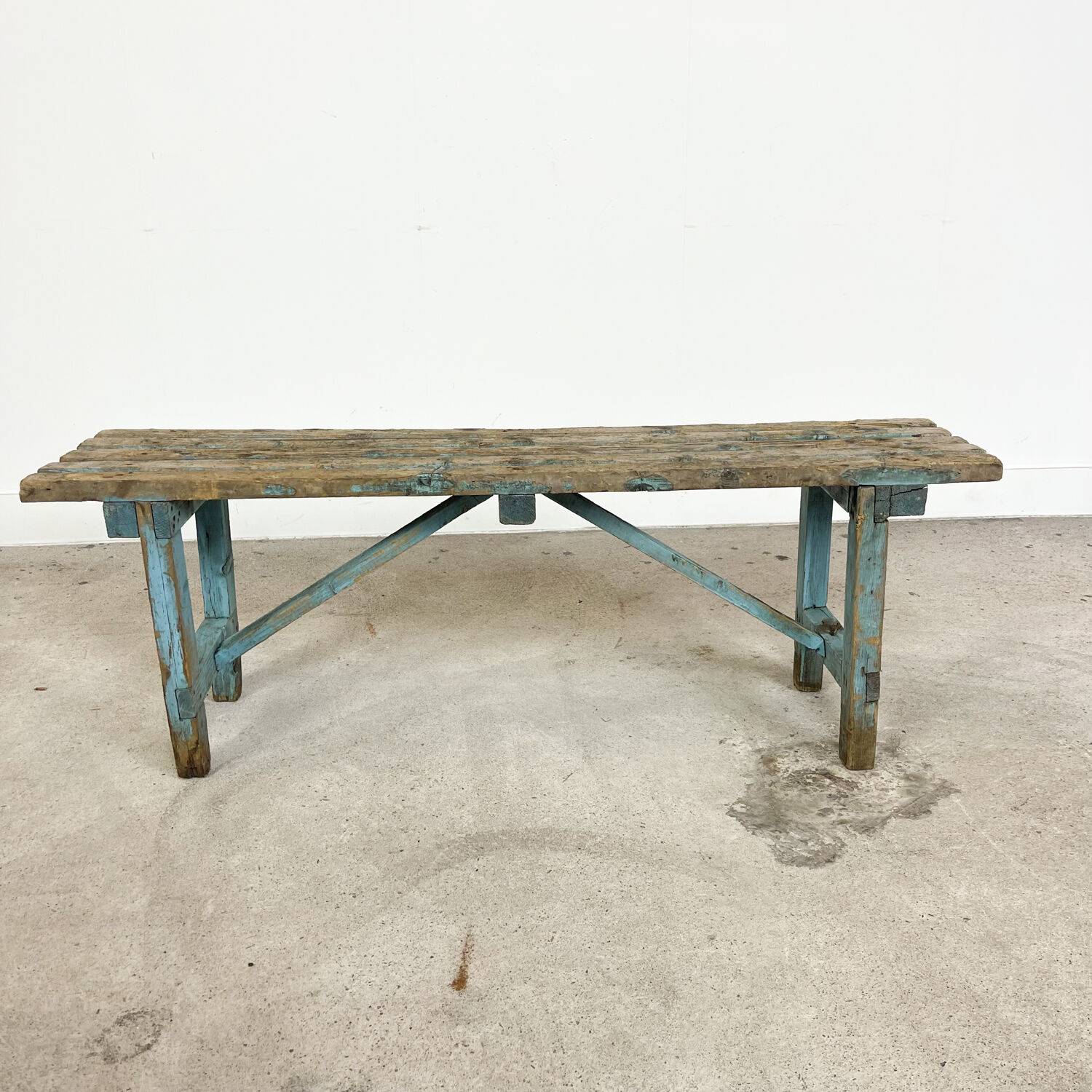 Light blue painted wooden farmhouse bench