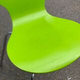 Fluorescent green Scandinavian chair in curved wood and steel