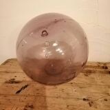Old glass ball of fishing net marked "LT"