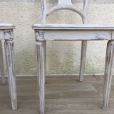 Pair of old white canne chairs