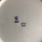 Set of 4 antique Giraud Sauviat porcelain plates.