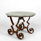 Art Deco round pedestal table in marble and wrought iron, circa 1940