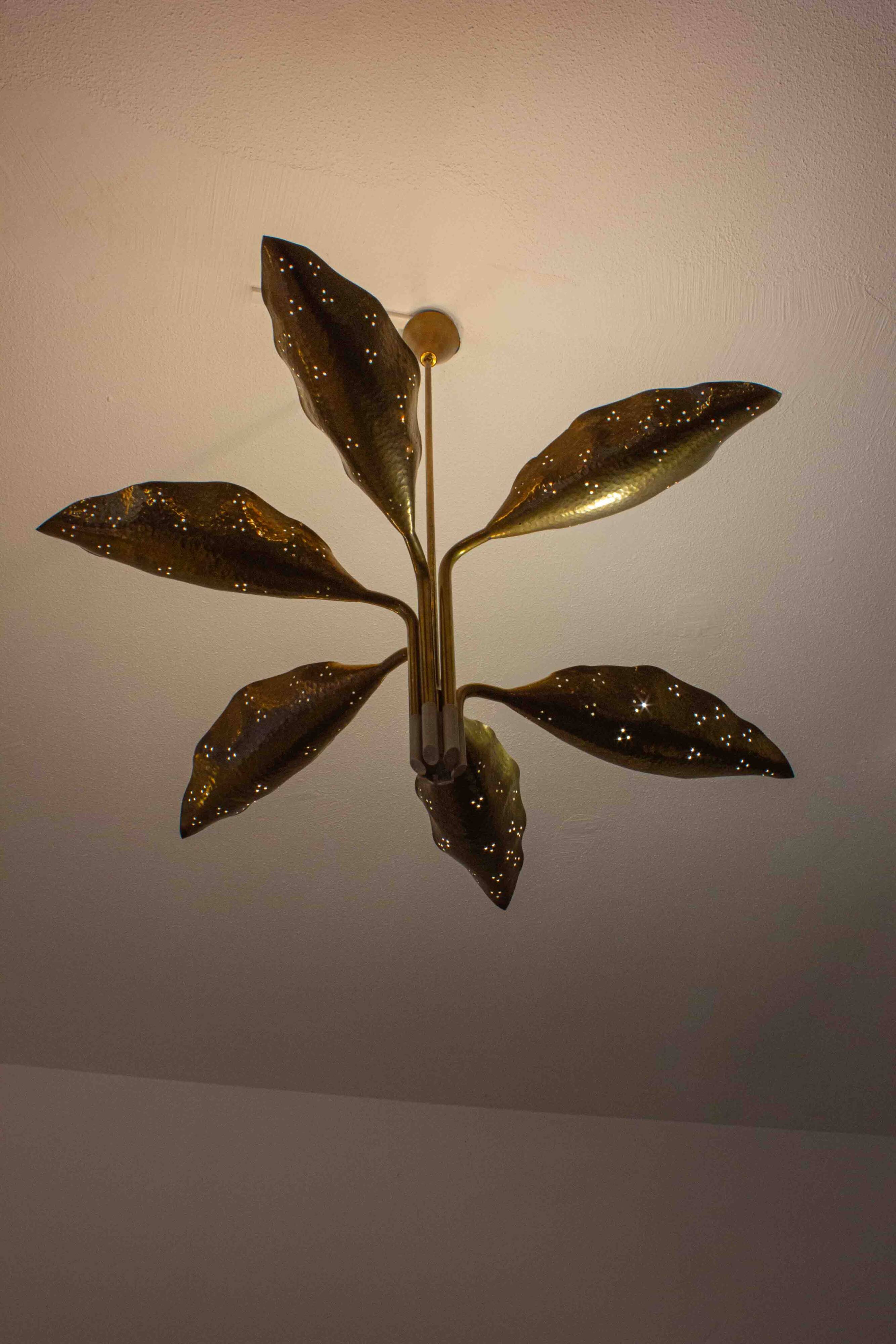 Incredible chandelier with perforated brass leafs by A.  Lelii, Italy 1950s