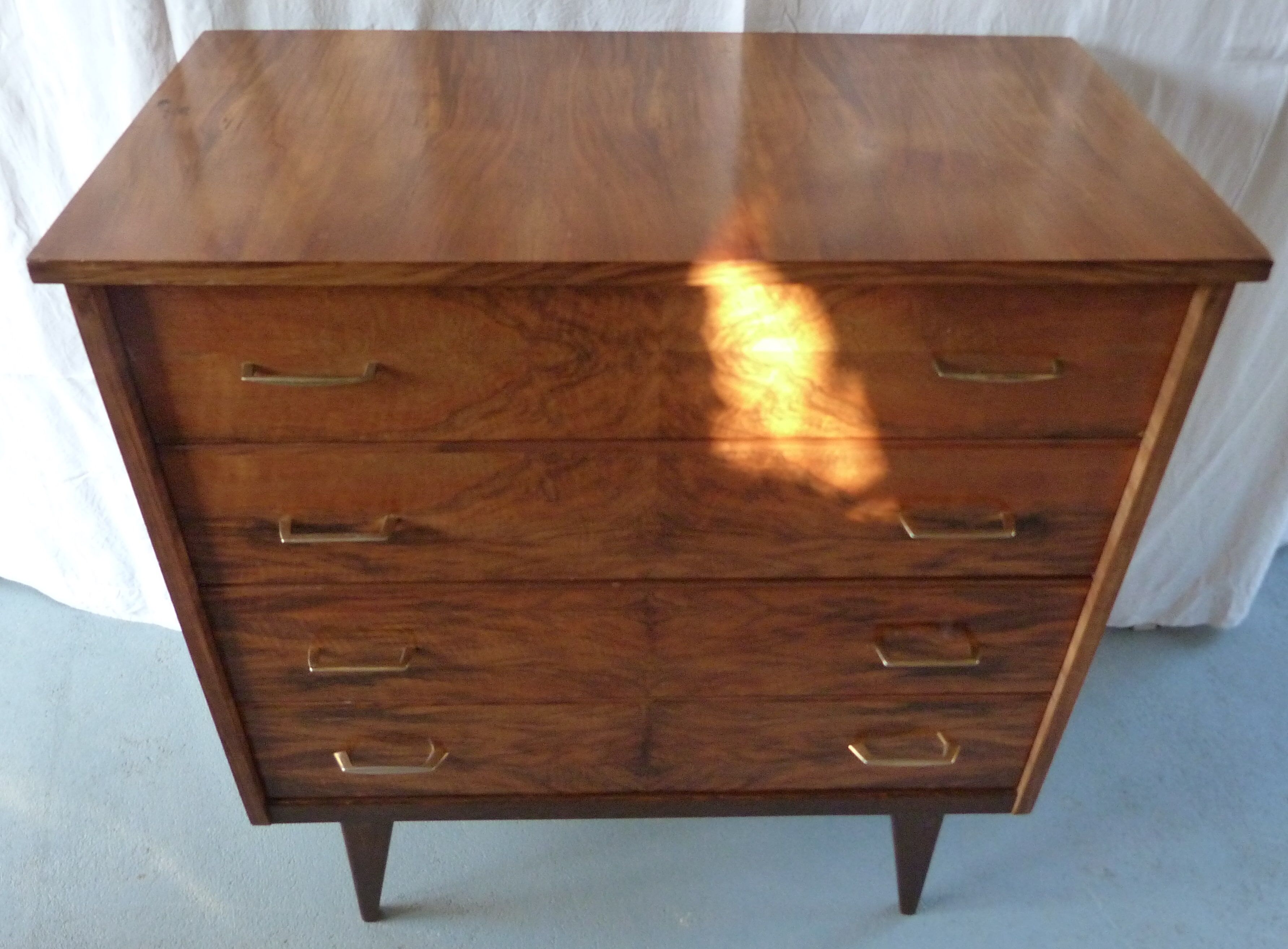 Compass feet chest of drawers