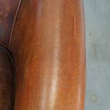 Cognac-colored sheepskin leather club chair