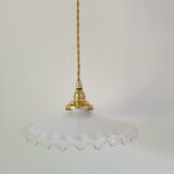 Serrated opaline suspension