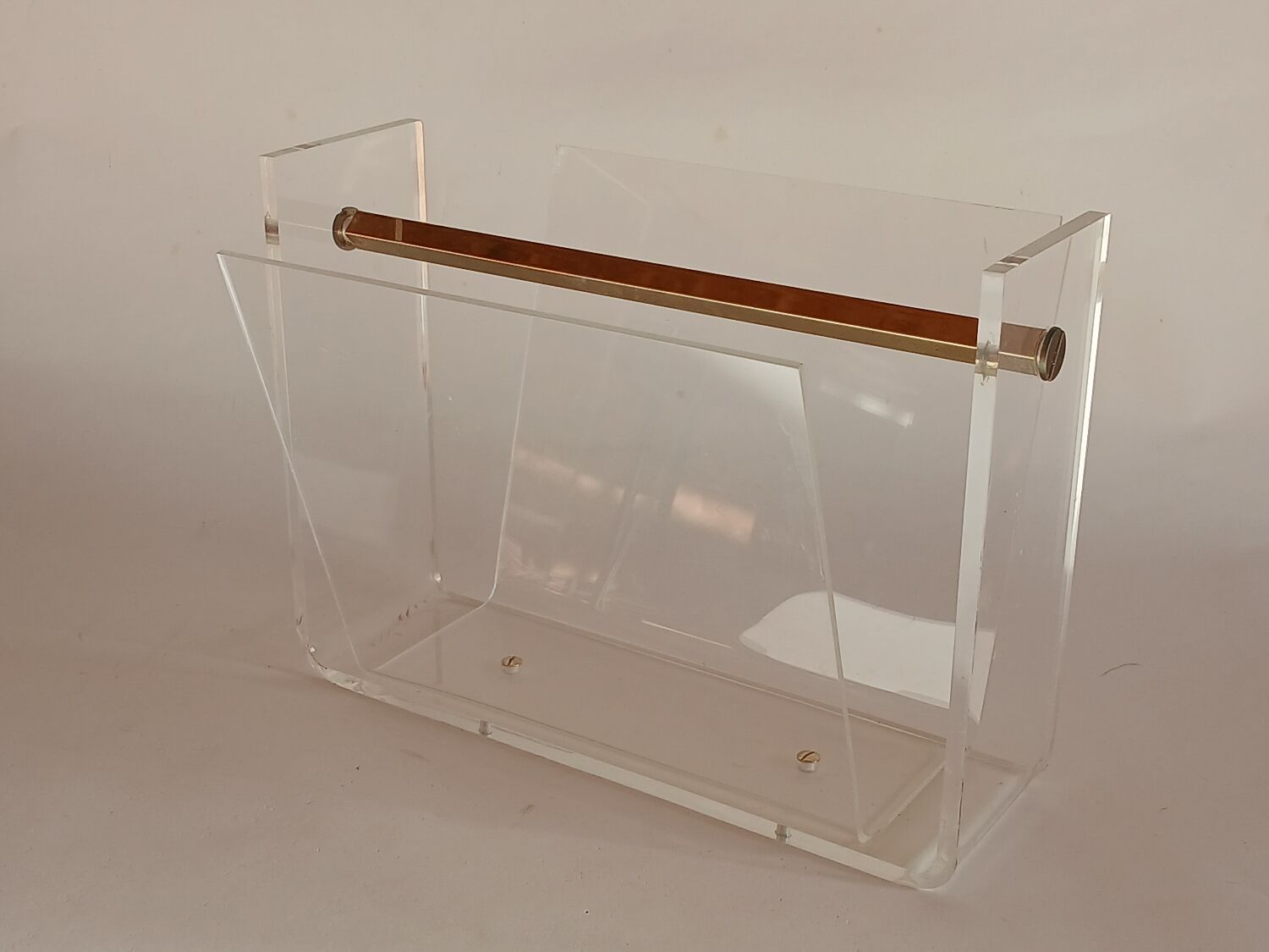 Acrylic magazine rack by David Lange